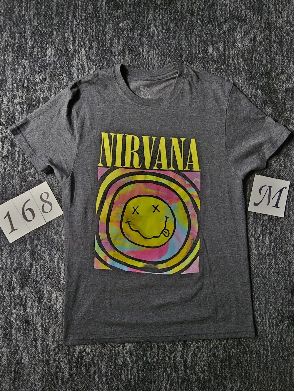 NIRVANA Gray Tee with Yellow Logo and Multicolor Tie-Dye Smiley